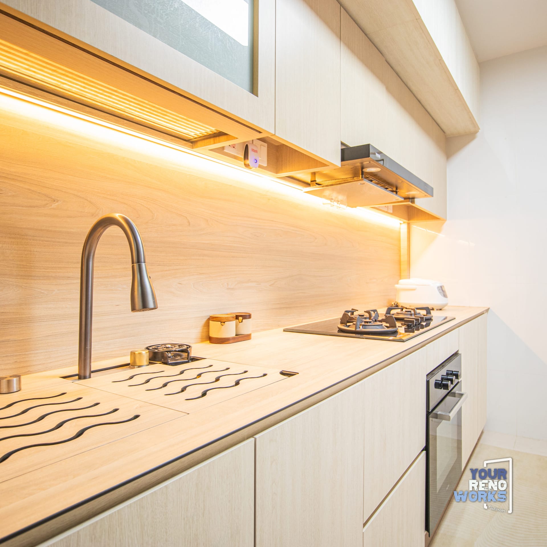 Double-storey HDB executive maisonette overhaul with re-engineered staircase and modern minimalist kitchen