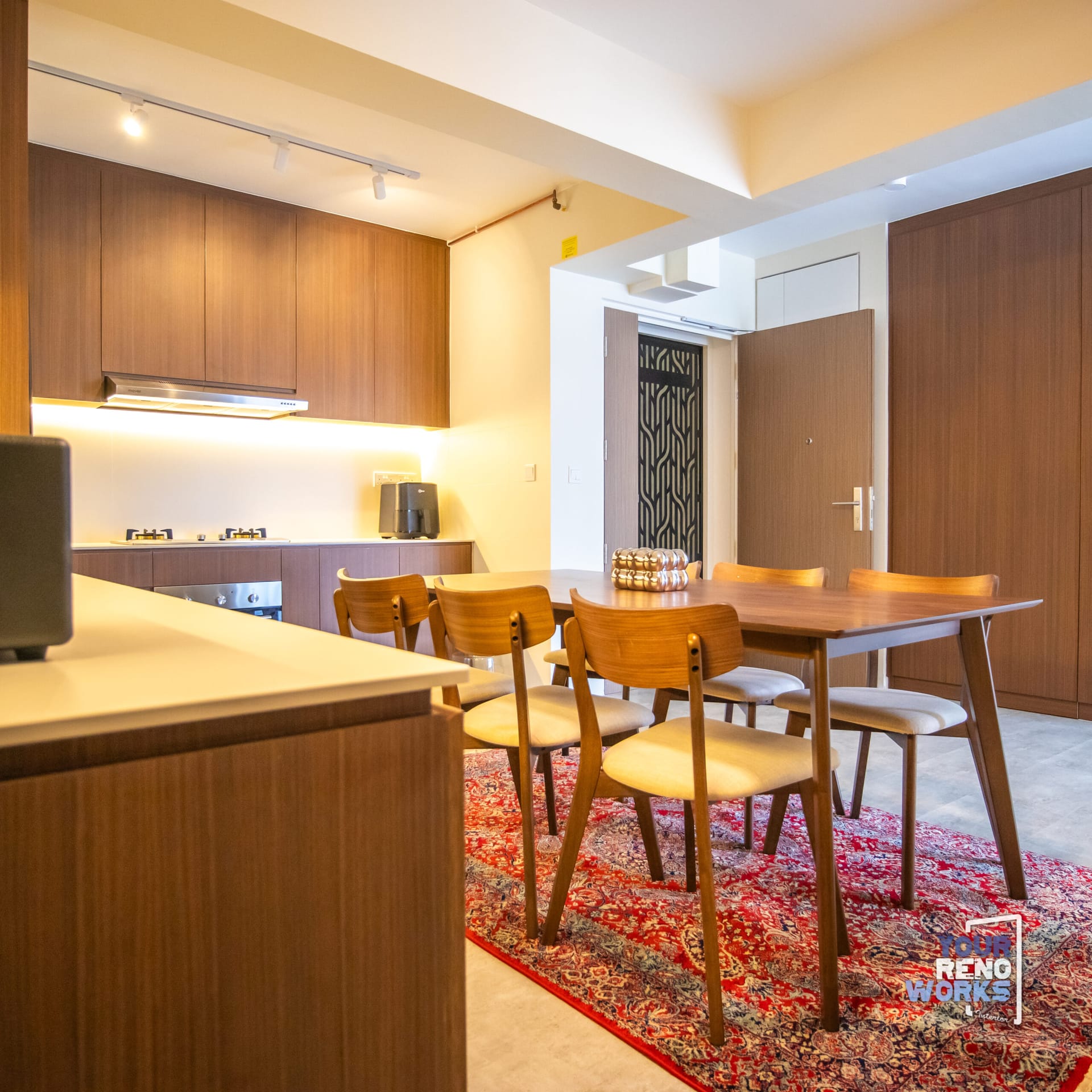 Resort-style contemporary oasis condo interior with organic stone textures